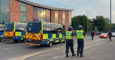 Two arrested after police assaulted during violent disorder after protest outside hotel in Manchester