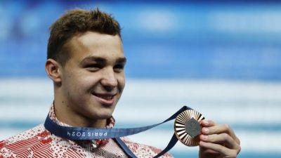 Acrobats' son Kharun flips script to win medal for Canada