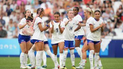 USA women's soccer wins group after 3rd straight win to open Olympics