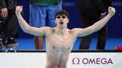 China's Pan wins 'magic' 100m freestyle gold in new world record