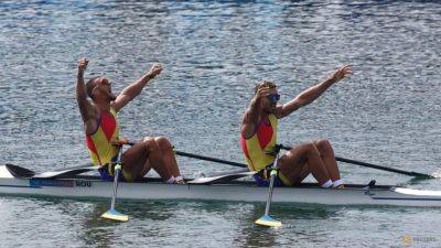 Rowing-Romania grab gold in men's double sculls