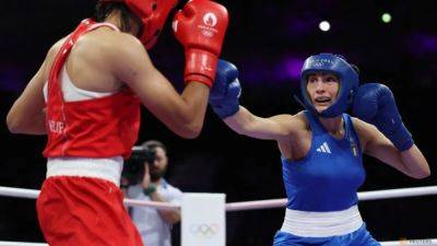 Italy's Carini says she can hold her head high after fight against Khelif