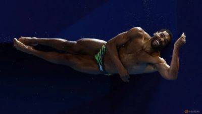 Diving-Jamaica's first male Olympic diver hopes to inspire younger generation - channelnewsasia.com - Britain - county Lewis - Jamaica