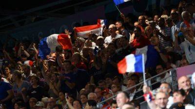 Athletes, organisers cheer the return of fans in Paris - channelnewsasia.com - Britain - Canada