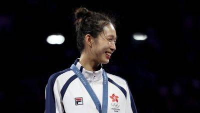 Fencing-Champion Kong still in a daze on Hong Kong return