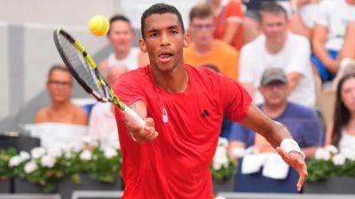 Canada's Auger-Aliassime to play Alcaraz in men's singles semis after topping Ruud