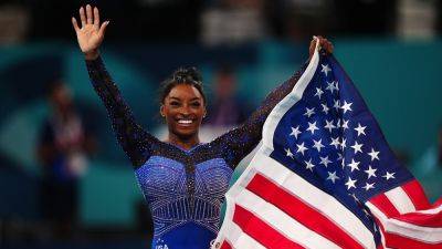 Simone Biles - International - Rebeca Andrade - Simone Biles wins Olympic gold medal in women's all-around final with stunning floor exercise routine - foxnews.com - France - Brazil - Usa