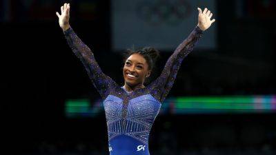 Simone Biles - International - Rebeca Andrade - Simone Biles wins Olympic all-around title; bronze for Suni Lee - ESPN - espn.com - Brazil - Usa - Romania - state Texas - Soviet Union