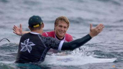Surfing-Australian surfing judge removed after photo with Australian surfer