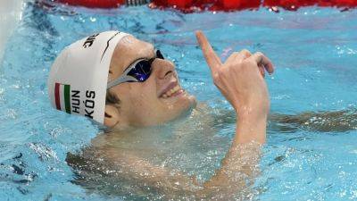 Paris Olympics - Michael Phelps - Leon Marchand - Hungary's Kos wins men's 200m backstroke gold - channelnewsasia.com - France - Switzerland - Hungary - Greece