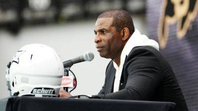 Deion Sanders spars with media in testy Colorado presser - ESPN