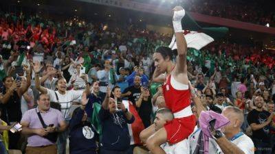 Algerian gender-row boxer Imane Khelif storms to Olympic gold