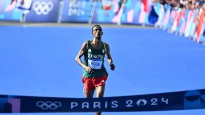 Eliud Kipchoge - Paris Games - Paris 2024: Tamirat Tola takes marathon gold as Eliud Kipchoge fails to finish - rte.ie - Belgium - Ethiopia - New York - Kenya