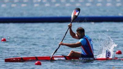 Canoeing-Sweet and fish sacrifices give golden payoff for Czech paddler Dostal