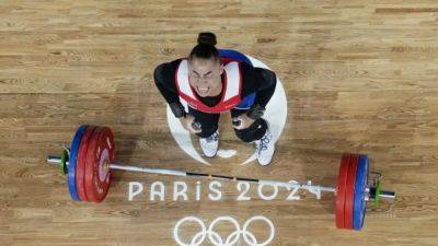 Weightlifting-Norway's Koanda wins women's 81kg gold