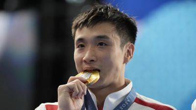 Cao wins men's 10m platform to complete China's golden sweep