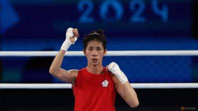 Taiwan's Lin wins women's featherweight gold amid gender dispute - channelnewsasia.com - Algeria - Turkey - Poland - Taiwan - Philippines