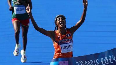 Record-setting Sifan Hassan captures 3rd Olympic gold medal, 1st in women's marathon