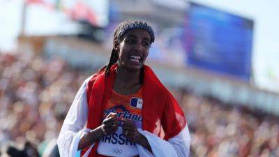 Netherlands' Hassan grinds out thrilling marathon gold in sprint finish