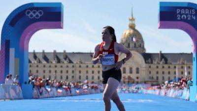 Paris Games - International - Bhutan's marathon runner gets standing ovation for last-place finish - channelnewsasia.com - Bhutan