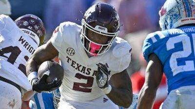 Sources: Injured Texas A&M RB Rueben Owens will miss season - ESPN