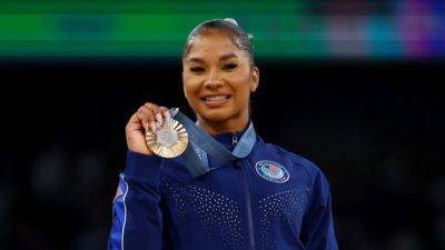 Gymnastics-USA Gymnastics says video proves Chiles should keep bronze