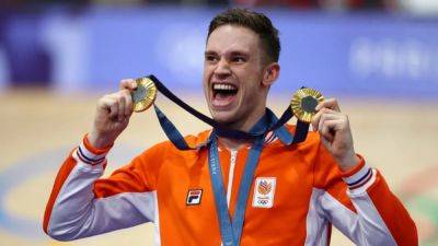 Dutch master Harrie paints Paris velodrome orange