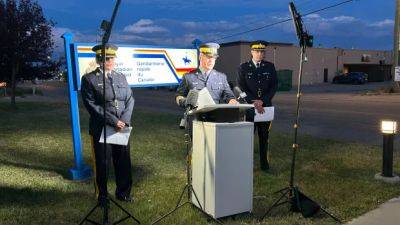 RCMP identify 2 men accused in fatal shooting of Good Samaritan east of Calgary