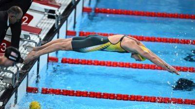 Triumphant Australian team return home with record gold medal haul