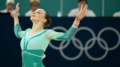 London Games - Romanian gymnast Ana Barbosu presented with controversial Olympic bronze medal - cbc.ca - Usa - Romania - Jordan - Chile