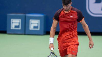 Frustrated Carlos Alcaraz falls to Gael Monfils in Cincinnati - ESPN