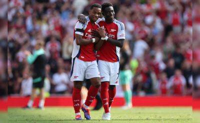 Arsenal Sink Wolves In Flying Start To Premier League Title Charge