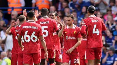 Liverpool start Slot era with win, Arsenal beat Wolves