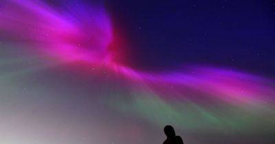 Northern Lights: Rare 'red alert' for UK - when to look into night sky - manchestereveningnews.co.uk - Britain - Scotland - Ireland