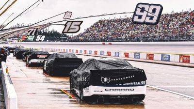 Chase Elliott - Ryan Blaney - International - NASCAR race at Michigan suspended by rain after 51 laps; Chase Elliott leads - foxnews.com - Los Angeles - state Michigan