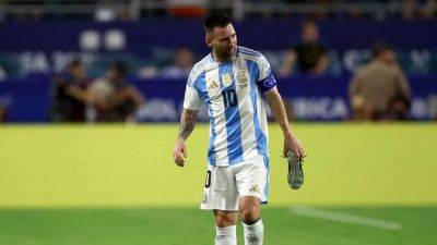 Lionel Messi - Emiliano Martinez - Angel Di-Maria - Leandro Paredes - Cristian Romero - Alexis Mac Allister - Lionel Scaloni - Juan Musso - Gonzalo Montiel - Lisandro Martínez - Guido Rodríguez - Rodrigo De-Paul - Nahuel Molina - Nicolas Otamendi - Nicolas Tagliafico - Valentin Castellanos - Nicolas Gonzalez - Walter Benítez - Alejandro Garnacho - Geronimo Rulli - International - Enzo Fernandez - Injured Messi left out of Argentina's World Cup qualifiers squad - channelnewsasia.com - Germany - Colombia - Usa - Argentina - Chile