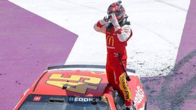 Michael Jordan - Kyle Larson - Joey Logano - Denny Hamlin - Chase Elliott - Tyler Reddick - William Byron - Ross Chastain - International - Tyler Reddick wins rain-delayed NASCAR Cup race at Michigan - ESPN - espn.com - Jordan - county Martin - state Michigan - county Dillon