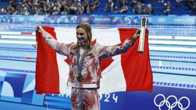 Katie Ledecky - Summer Macintosh - Leon Marchand - Regan Smith - Summer rolls on as Ledecky scales new heights - channelnewsasia.com - France - Usa - Australia - Canada - China - Hungary - county Mcintosh