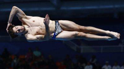 Diving-France's Bouyer tells fans to focus on his dives not his body