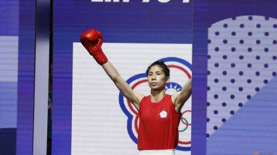 Boxing: Taiwan's Lin beats Uzbek Turdibekova amid fierce gender row
