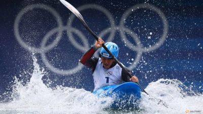 Canoeing-Clarke and Prigent top time trials as kayak cross gets set for Games debut
