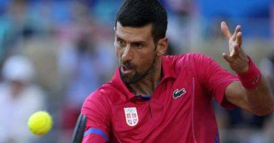 Iga Swiatek - Carlos Alcaraz - Novak Djokovic - Lorenzo Musetti - Novak Djokovic will take on Carlos Alcaraz in blockbuster Olympic final - breakingnews.ie - Italy