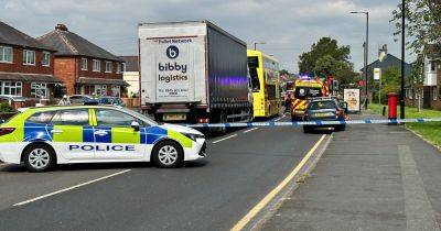 Emergency services stage rescue operation after two-car crash on busy road