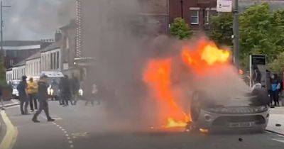 LIVE Police stations 'destroyed' and cars in flames as rioters bring havoc to streets of Sunderland