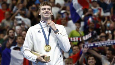 Michael Phelps - Leon Marchand - Crazy to be compared to Phelps and Spitz, says Marchand - channelnewsasia.com - Usa