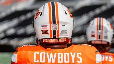 Tim Warner - Oklahoma State football players to wear QR codes on their helmets that link to NIL fund - foxnews.com - state Texas - state Oklahoma