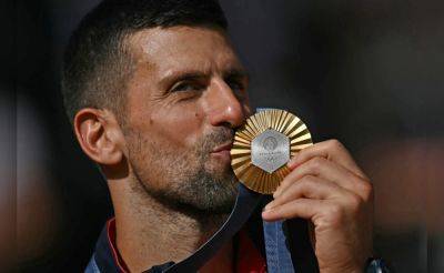 Iga Swiatek - Carlos Alcaraz - Novak Djokovic - Paris Olympics - Donna Vekic - Novak Djokovic Chases 25th Grand Slam Title In US Open After Clinching Olympics Gold - sports.ndtv.com - France - Italy - Usa - Australia - Washington - county Mcdonald