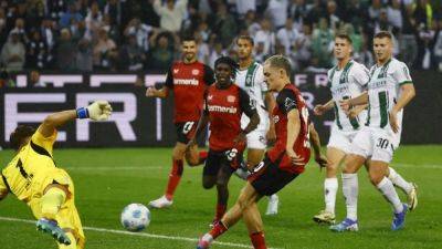 Bayer Leverkusen - Alejandro Grimaldo - Edmond Tapsoba - Florian Wirtz - Last-gasp Wirtz goal earns Leverkusen 3-2 win at Gladbach in Bundesliga opener - channelnewsasia.com - Germany - Switzerland