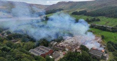 Firefighters battle huge blaze at derelict mill near beauty spot