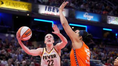 Caitlin Clark - Diana Taurasi - Kelsey Mitchell - Michael Conroy - Caitlin Clark knocks down WNBA record, puts together historic stat line in Fever's win - foxnews.com - state Indiana - county Thomas - state Connecticut